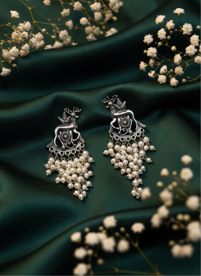 Royal Oxidized Silver Deer Motif Earrings with Pearl Tassels