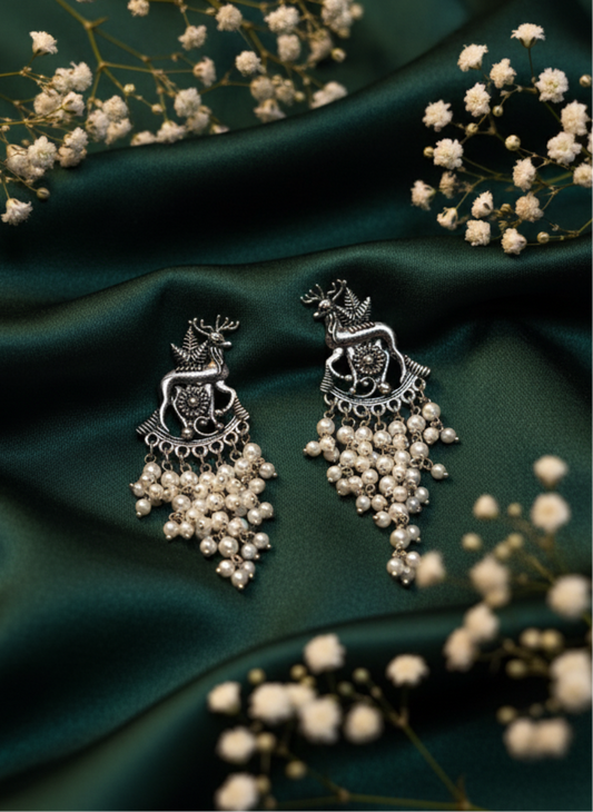 Royal Oxidized Silver Deer Motif Earrings with Pearl Tassels