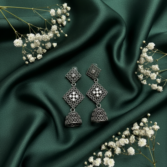 Elegant Silver Earrings with Intricate Design